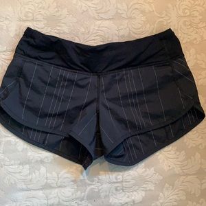 Black lulu lemon shorts with detailing